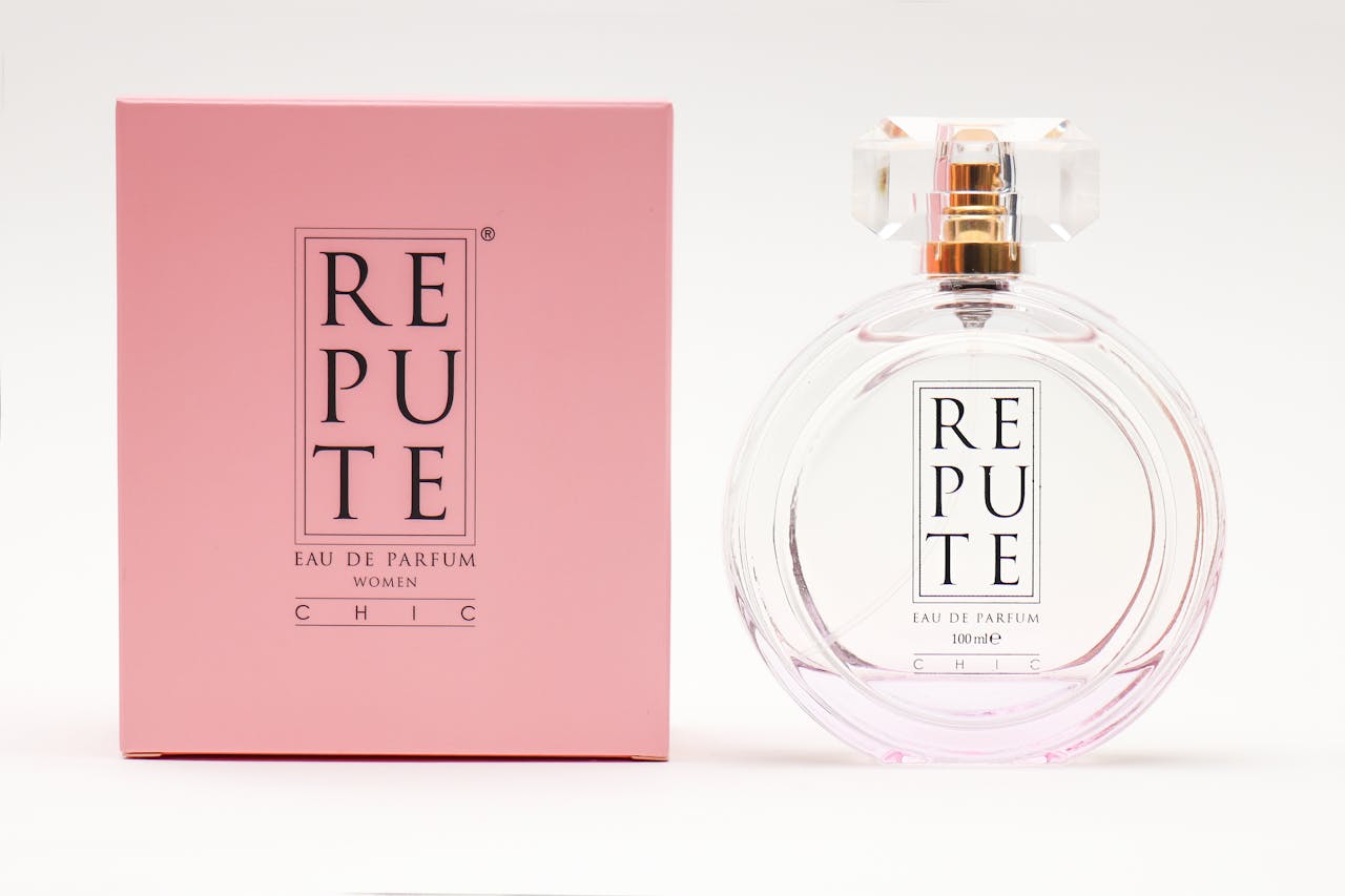 services-02 High-quality photo of Repute perfume bottle and packaging, showcasing luxury design.